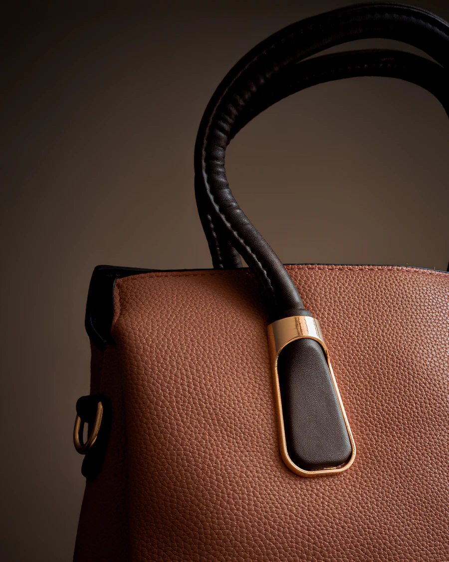 Luxury leather accessory detail with gold hardware