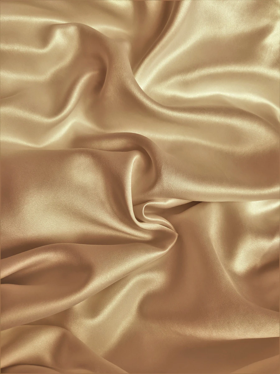 Close-up of premium gold fabric texture